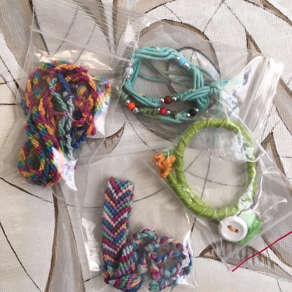 Assortment of homemade knot bracelets